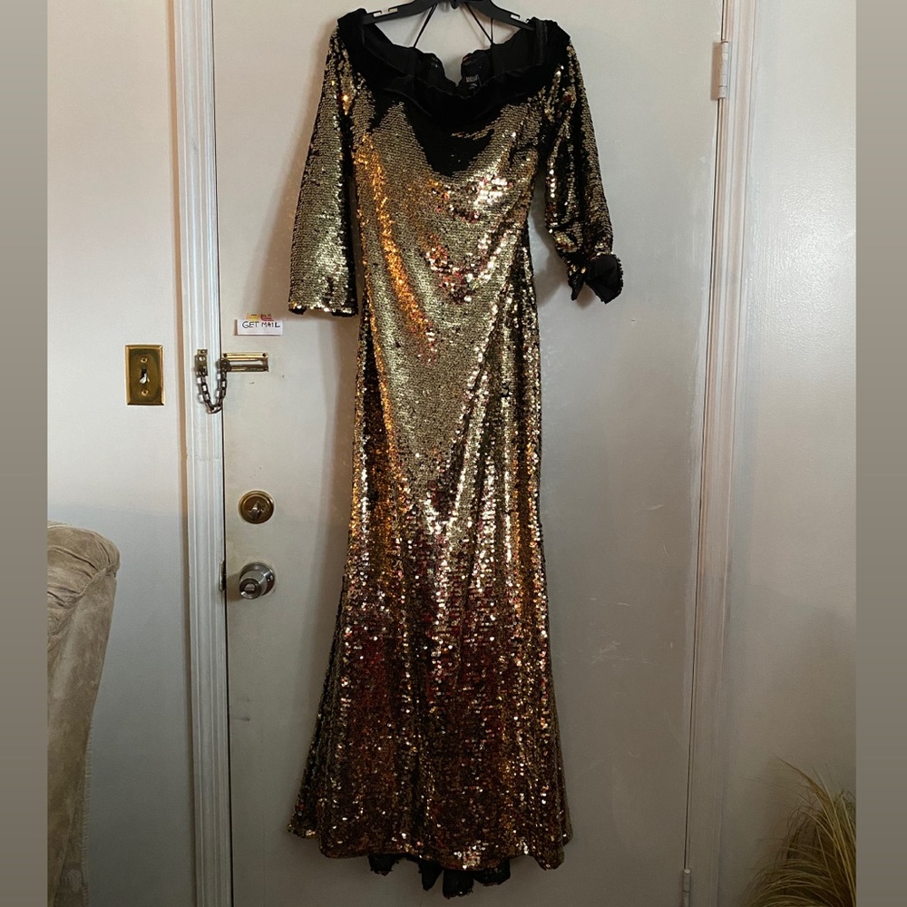 Gold sequence gown with black velour collar